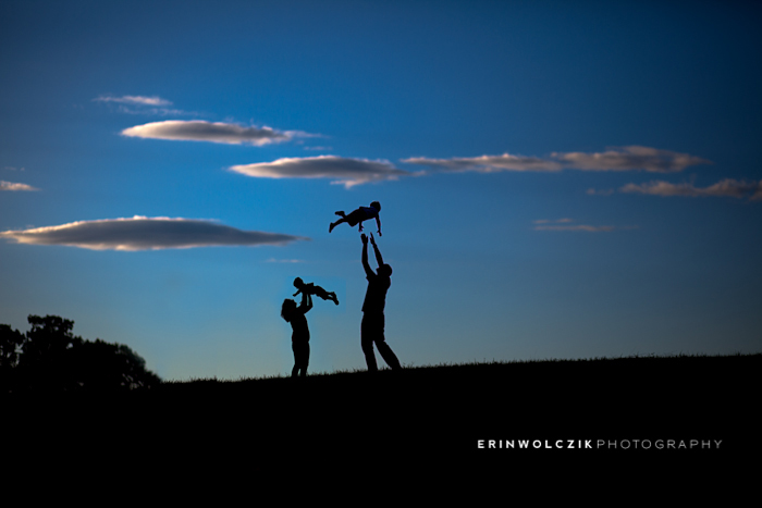 silhouette of family in a field . southborough, ma